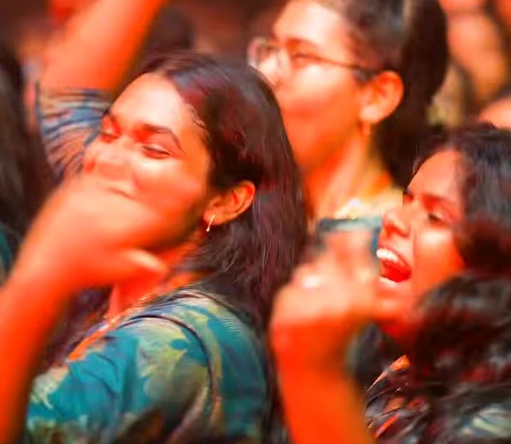 Students dancing and cheering in the crowd at KRazia ’26