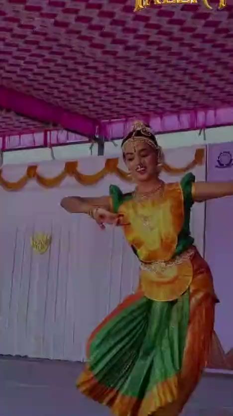Students performing classical dance solos on the Talentia ’26 stage